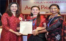 Mrs Shreya Badakh and Mrs Vidaya Kamble (teachers) receiving prizes for Best Direction and Best Script Writer 2019-20